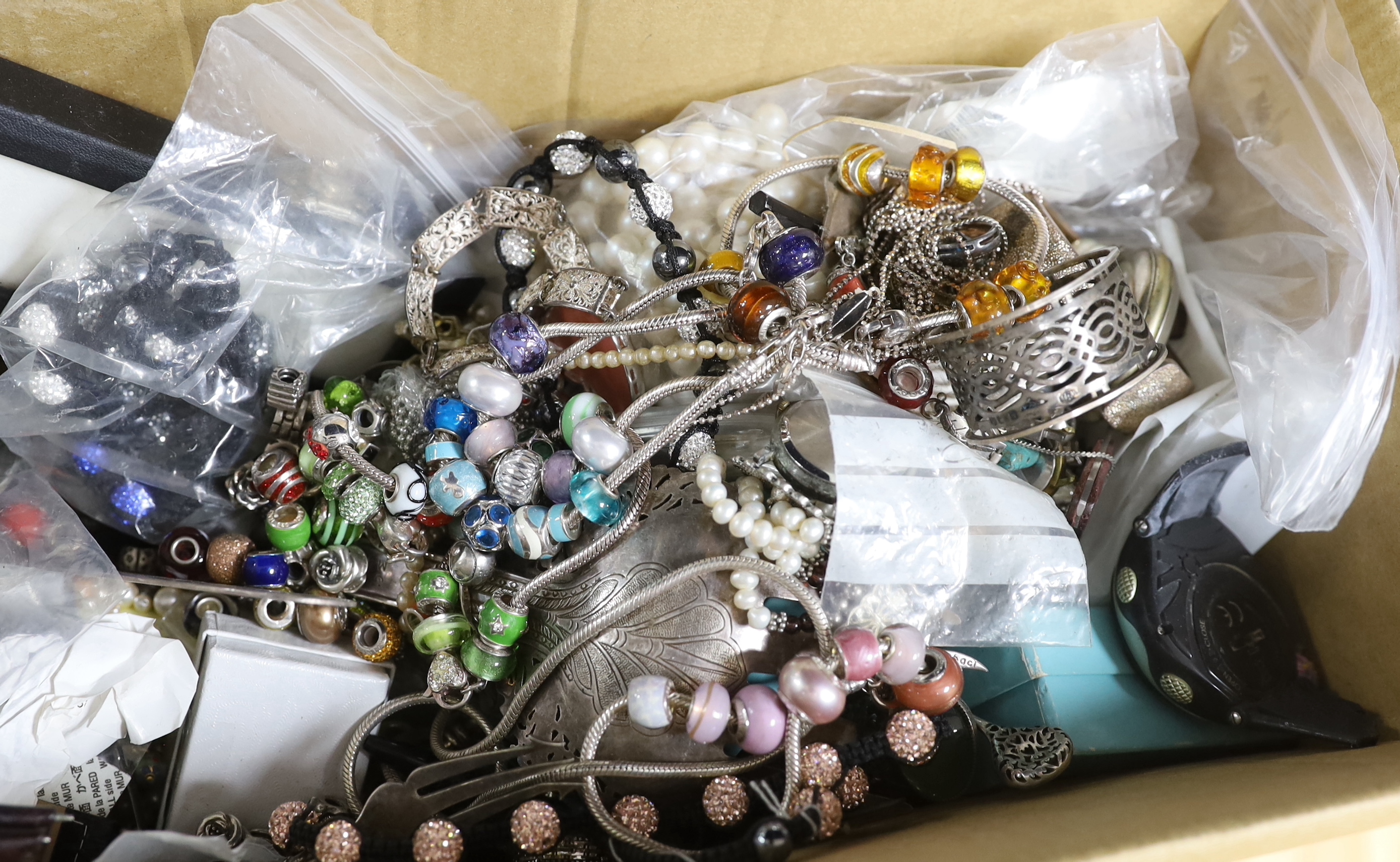 A large quantity of assorted collectables including silver, costume jewellery, watch movements etc.